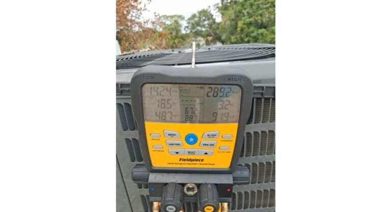 HVAC unit with a manifold gauge connected in Brandon, FL 33511