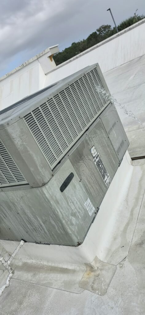 HVAC Unit on Rooftop with Water Spray in Wesley Chapel, FL 33543 HVAC unit on rooftop with water spray in Wesley Chapel, FL 33543