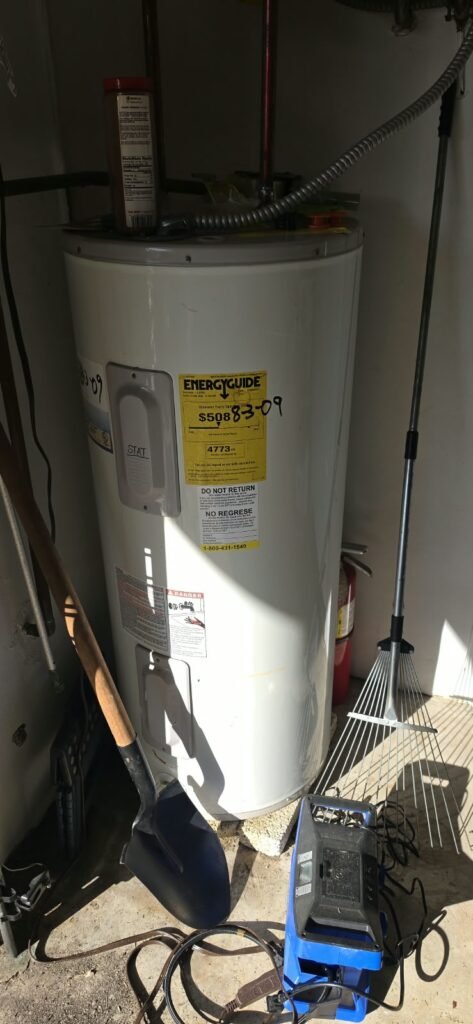 HVAC unit being sprayed with water in Clearwater, FL 33764