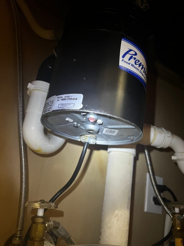 Installed garbage disposal with plumbing in Lithia, FL 33547