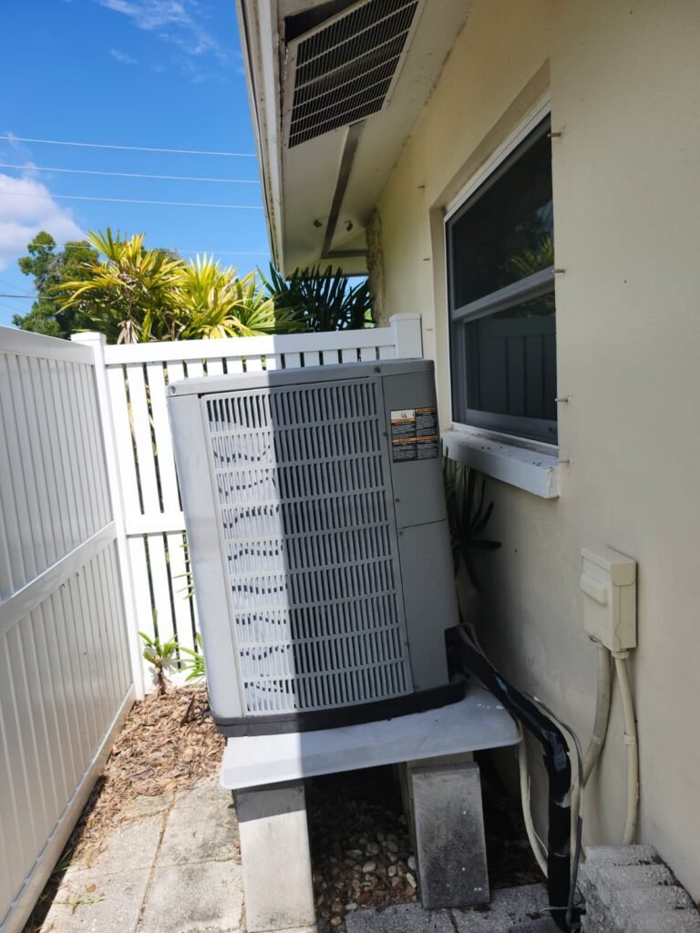 Installed outdoor AC unit on platform, St. Petersburg, FL 33703