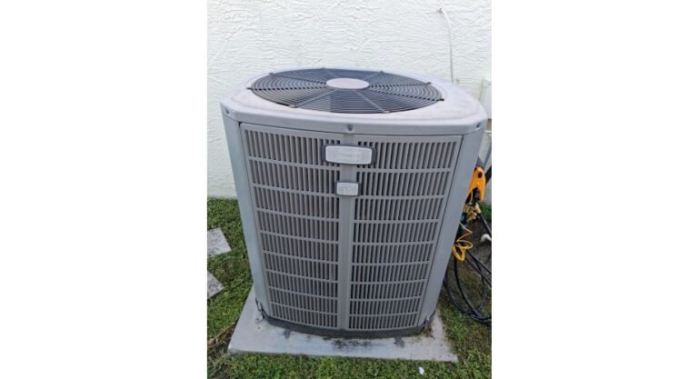 Outdoor HVAC condenser unit on concrete pad in Brandon, FL 33511
