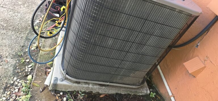 Outdoor HVAC Unit with Tools in Palm Harbor, FL 34683 Outdoor HVAC unit with tools during service in Palm Harbor, FL 34683