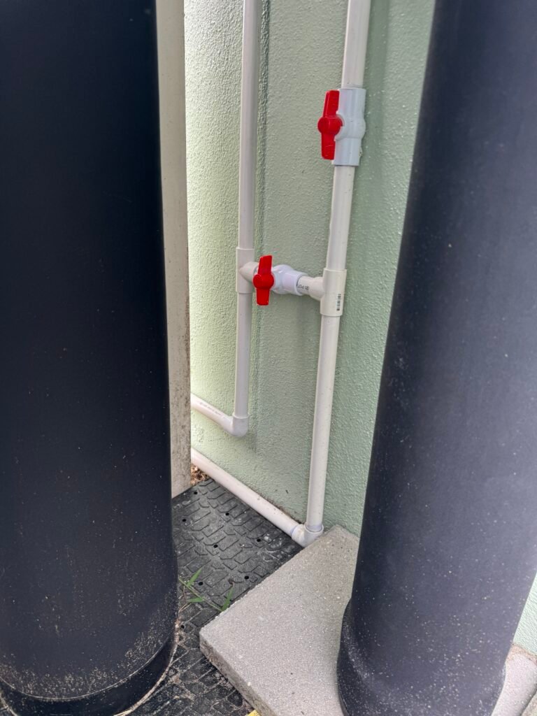 Plumbing pipes and valves between tanks in Brandon, FL 33510