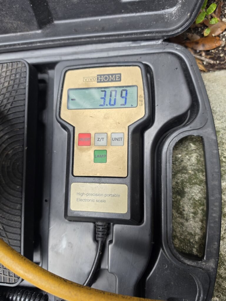 Refrigerant Handling with Digital Scale, Tampa, FL 33624 Digital scale during refrigerant handling in Tampa, FL 33624