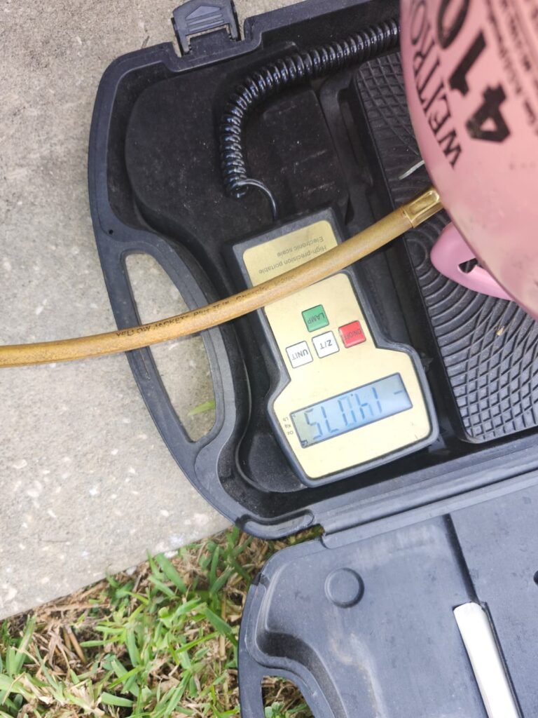 Refrigerant Weight Measurement in Tampa, FL 33635 Digital scale measuring refrigerant weight in Tampa, FL 33635
