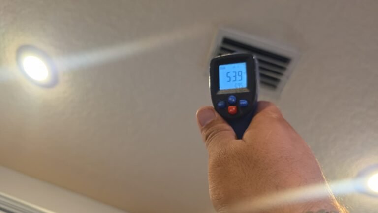 Temperature gun reading at ceiling vent in Tampa, FL 33625