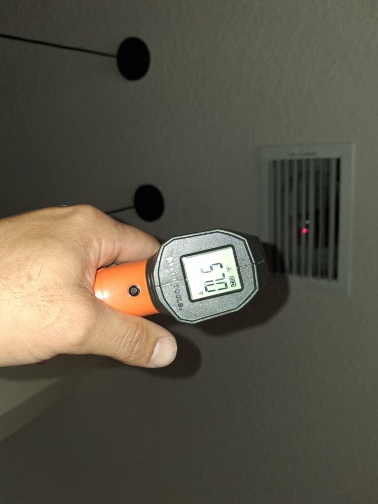 Temperature gun reading at air vent in Wesley Chapel, FL 33544