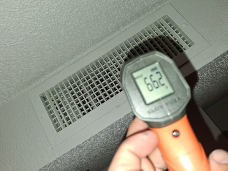 Infrared thermometer showing 66.2°F near vent in Brandon, FL 33511