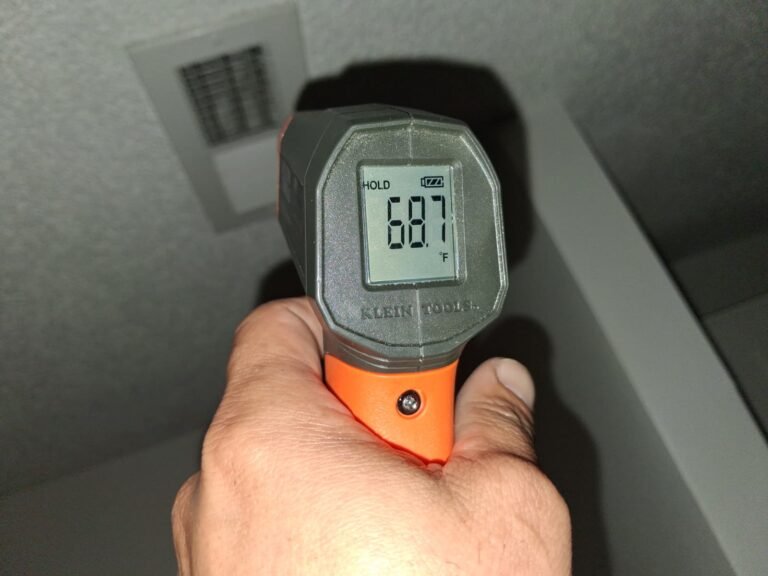 Infrared thermometer showing 68.7°F near vent in Brandon, FL 33511