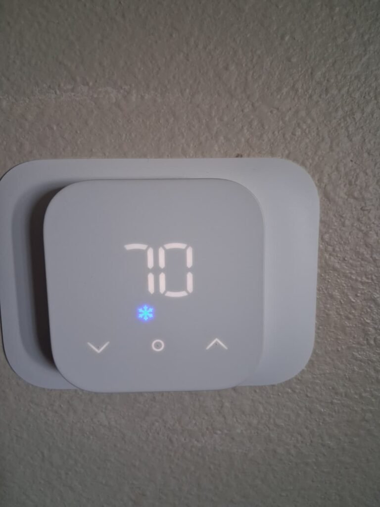 Digital thermostat set to 70 degrees in Wesley Chapel, FL 33544