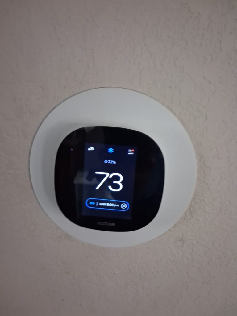 Digital thermostat set to 73 degrees, Tampa, FL 33603
