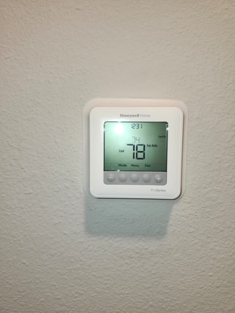 Newly installed thermostat after service in Tampa, FL 33619