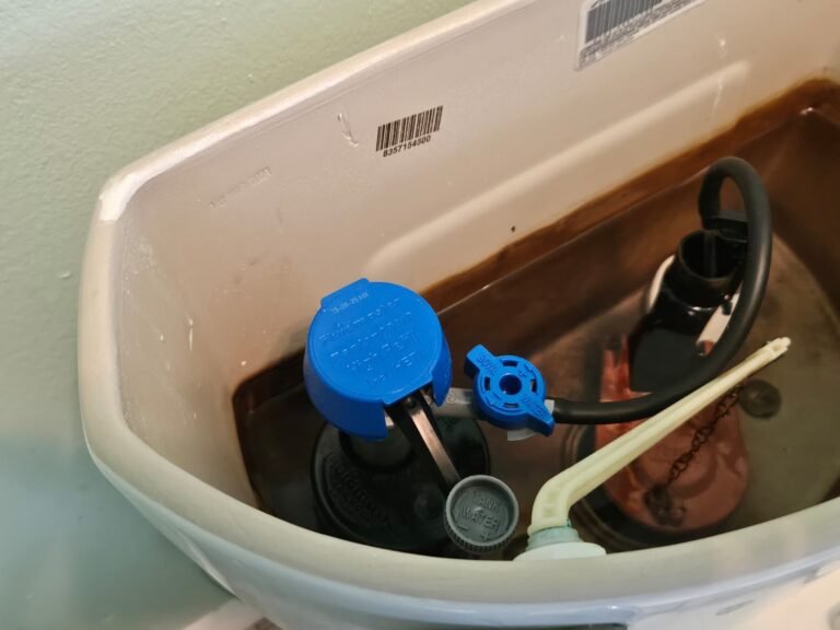 Toilet tank with new fill valve in Tampa, FL 33605