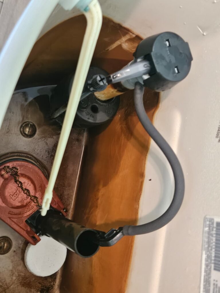 Toilet tank with fill valve and overflow tube in Tampa, FL 33605
