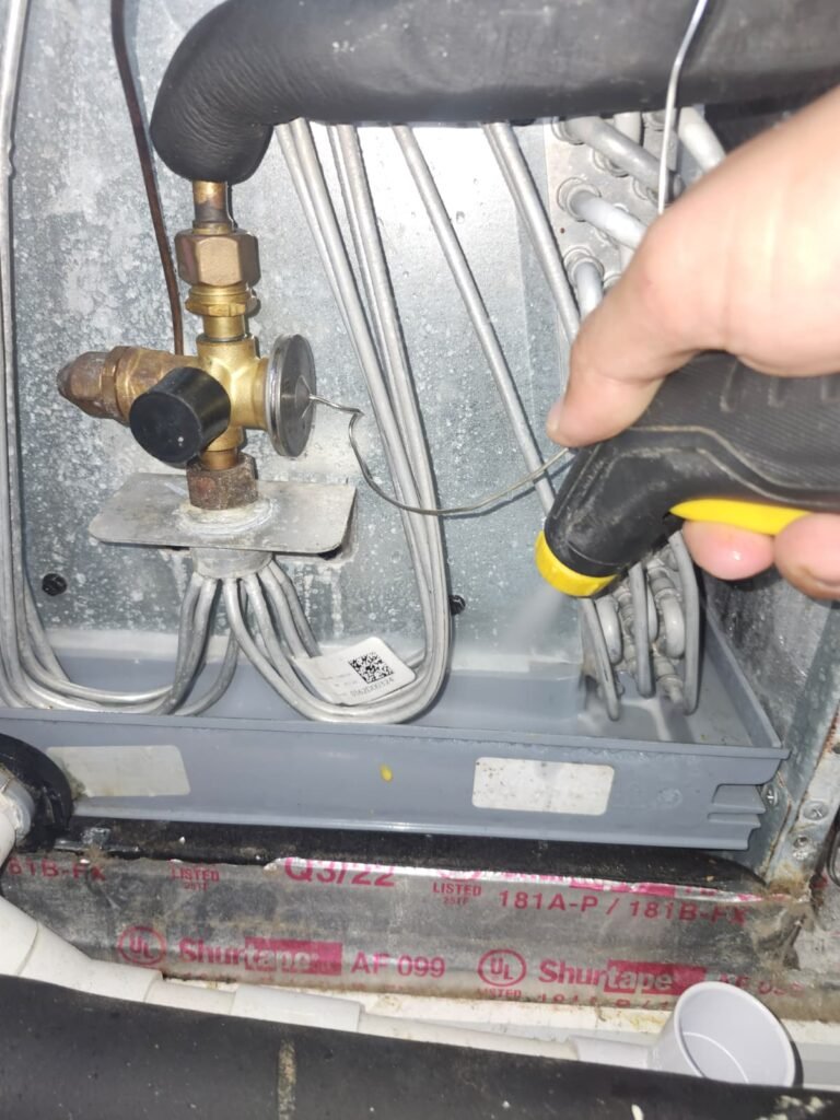 Tool used on HVAC component with wiring in Clearwater, FL 33762