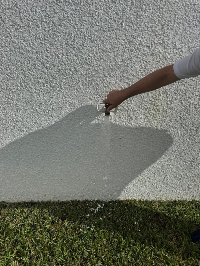 Turning outdoor faucet with water flow in Wesley Chapel, FL 33545