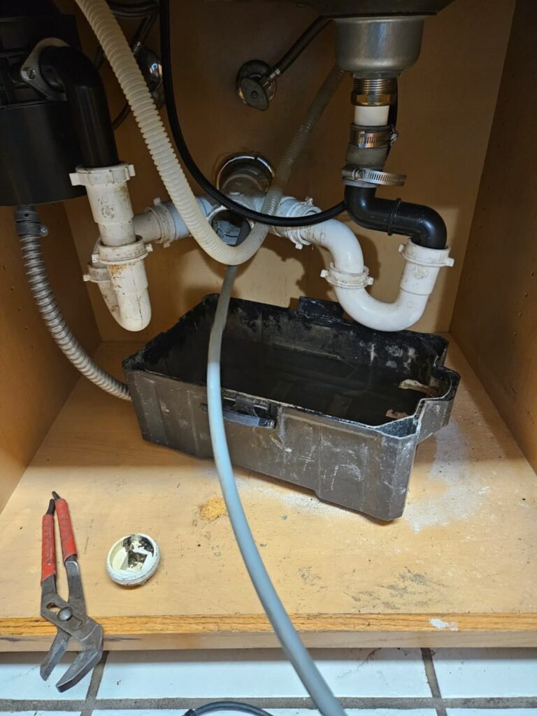 Under-Sink Plumbing in Brandon, FL 33511 Under-sink plumbing during sewer drain unclogging in Brandon, FL 33511