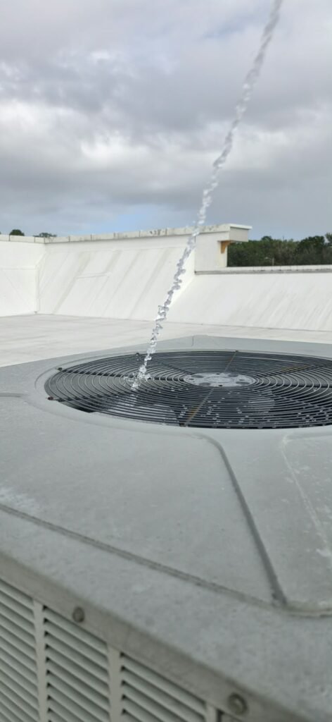 Water Spray on Top of HVAC Unit in Wesley Chapel, FL 33543 Water spray on top of HVAC unit in Wesley Chapel, FL 33543