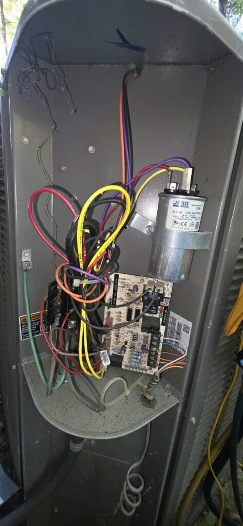 Detail: wiring and components inside HVAC unit, Lutz, FL 33558