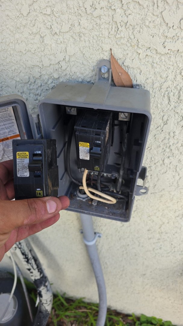 Home Therapist Cooling Heating And Plumbing Replacing Circuit Breakers In An Electrical Panel With Visible Wiring And Dirt