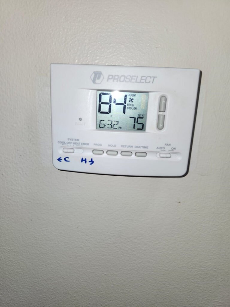 From one of our recent jobs: thermostat displaying a temperature of eighty four degrees cool mode activated with a scheduled time visible.