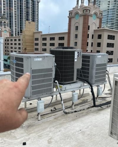 Rooftop Air Conditioners Pointing Hand
